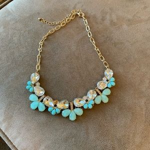 Necklace with light blue stones